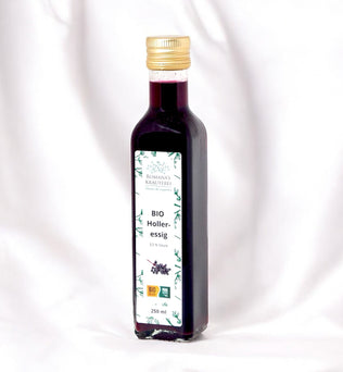 BIO Holleressig – Würziger Essig aus Apfelessig und schwarzen Holunderbeeren mit Zimt, Piment und Nelken. 100% biologisch und nachhaltig hergestellt in Österreich, 250 ml Flasche.